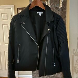 Ladies black faux leather jacket with zippers